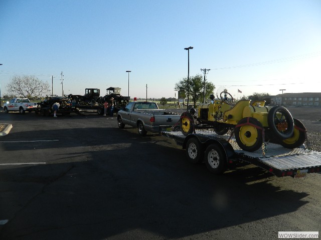 Russell loading his 1926 touring, Michael Pete- Kim's 1923 pickup truck and Betty's 1921 coupe.  Vern's speedster is loaded and ready to go