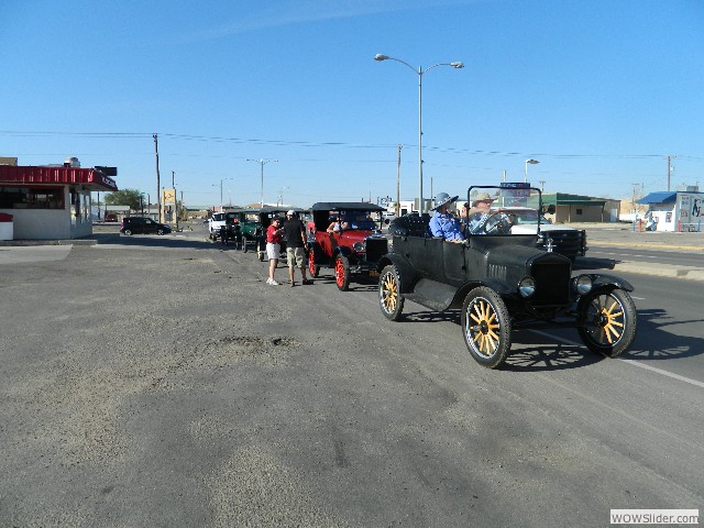 The Duncan's in their 1920 Model T touring car with the Petersons behind them in their 1927 Model T touring