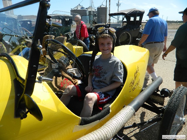 A young Model T enthusiast in the Azevado's 1921 Faultless speedster