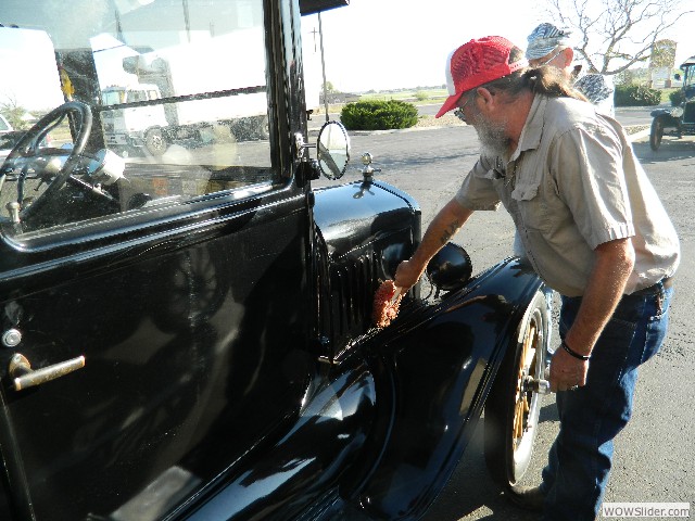 Vernon cleaning Don's 1924 Model T Tudor prior to the days tour