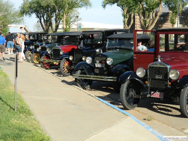 Tour cars lined up outside of the ENMU administration building