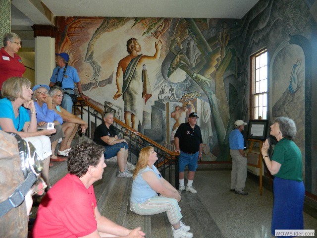 Dr. Caldwell describing the history of the murals