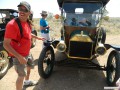 Documentary cameraman attaching a minicam on the fender of the Azevedo's 1912 Model T touring car