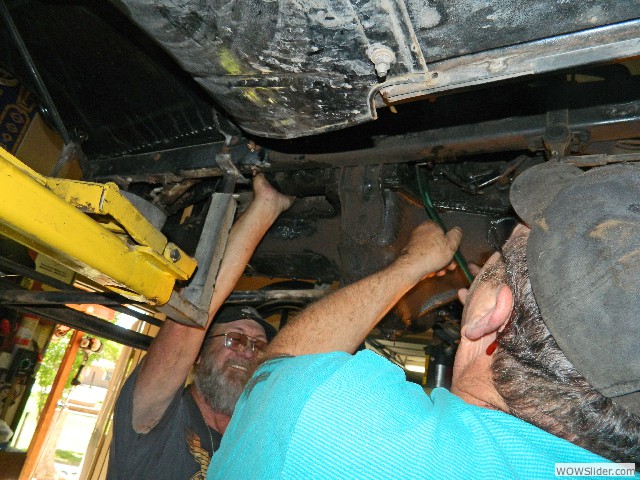Vernon and Michael removing stubborn starter components