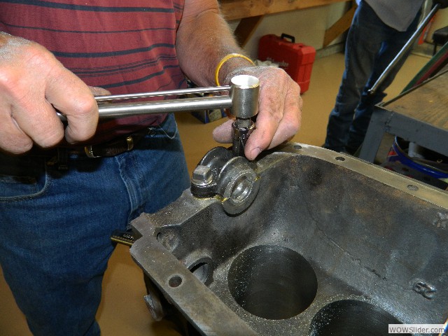 Gerald adjusting main bearing caps on Tom's engine