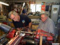 Larry assisting Tom with boring of rods and caps