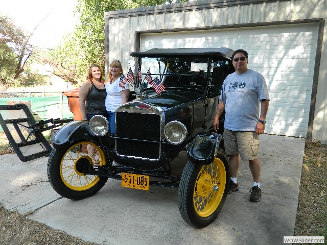 Sharon, Samantha, and Mark Domiguez with their 1927 Model T touring car