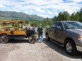 Vaughn and Tom Miles coming to the rescue of the Gauna's depot hack.  With four adults the hill was too steep!