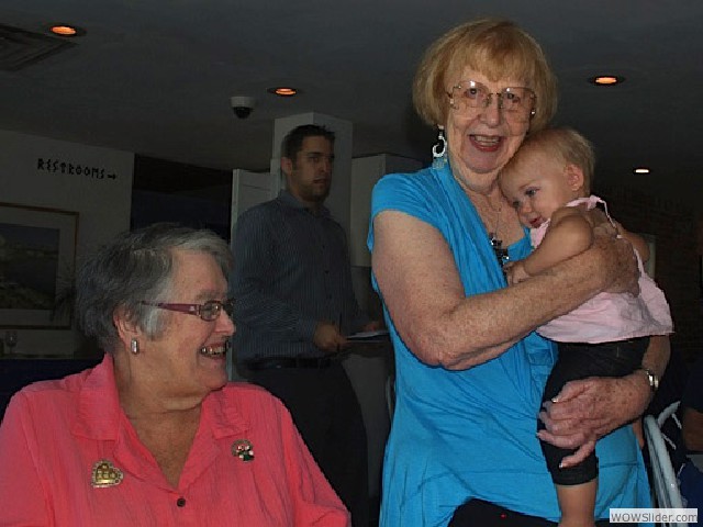 Kathy, and Bernice enjoy a cuddle with baby Scarlett