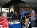 Bob and Liz talking with club president Dean