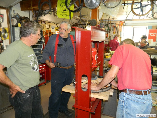 Pressing the new spokes into the felloe