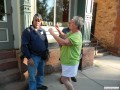 Janice helping Larry with his goggles