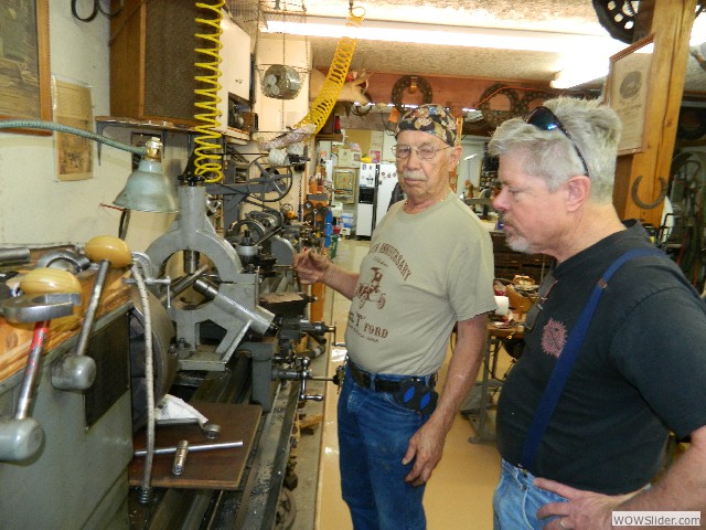 Neil showing Mark his 1920 Luverne firetruck driveline parts