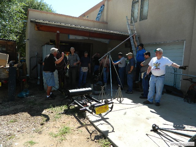 The crew looking over the take-apart 