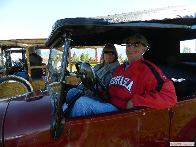 Susan and Kirk leaving in their 1927 Model T touring car
