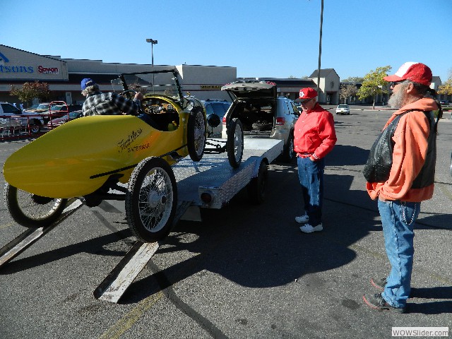 Larry unloading the Faultless Raceabout while Don and Vernon look on