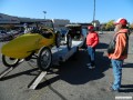 Larry unloading the Faultless Raceabout while Don and Vernon look on