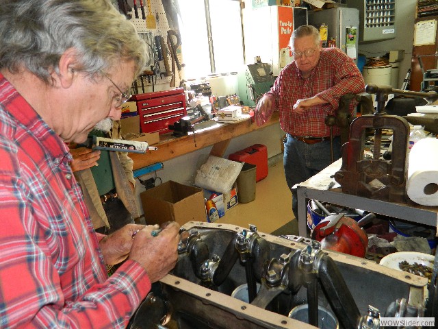 Larry examining Tom's 1926 engine