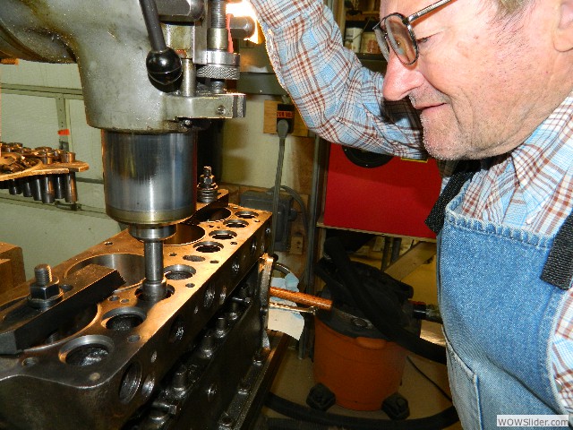 Bob doing final boring for the hardened valve seats on Mark's engine.