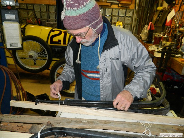 Paul unwrapping his top bows and irons.