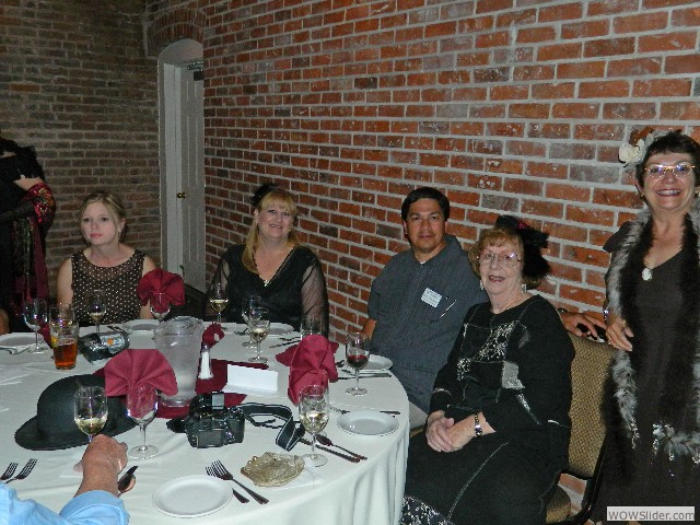 Banquet table including Tom and Kathy, Orlando and Melody, Sharon and Mark, Bernice, and Fran