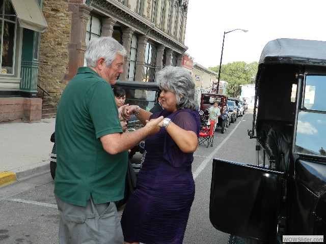 Bob assisting one of the wedding party out of the car
