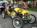 Larry giving one of the bride's maids a ride in his speedster