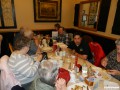 On the far side of the table are Liz, Bob, Mark, and Norma