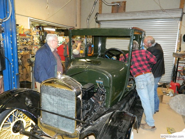 The crew at work on the coupe,