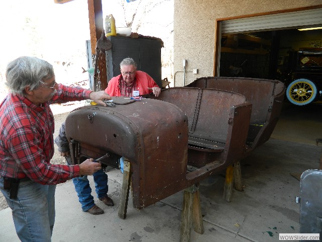 Larry used a nut splitting tool on a very stubborn nut that holds the gas tank in place.