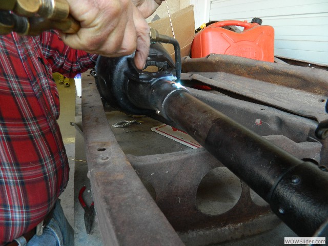 Larry preparing to braise Mark's Ruckstell axle housing to the axle tube.