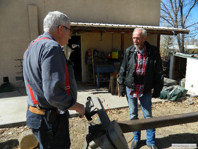 Bob and Dean cutting off a section of pipe