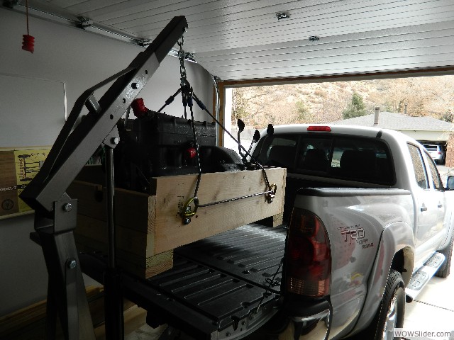 Mark unloading the 1925 engine at home.