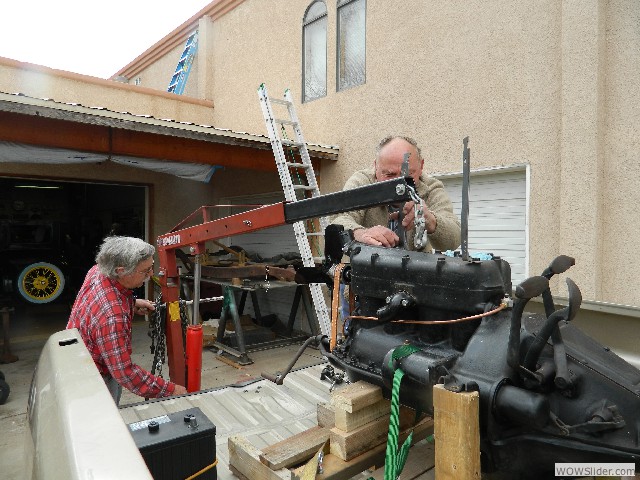 Larry and Dave preparing to hoist the engine.