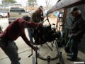 Lowering the engine onto the test stand.