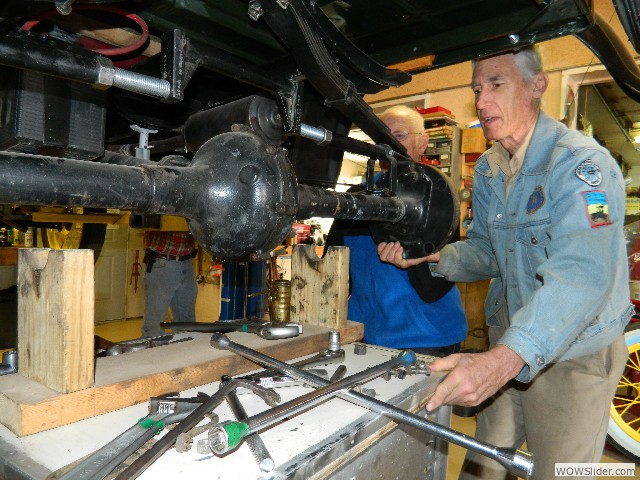 John examining the spring expander tool.