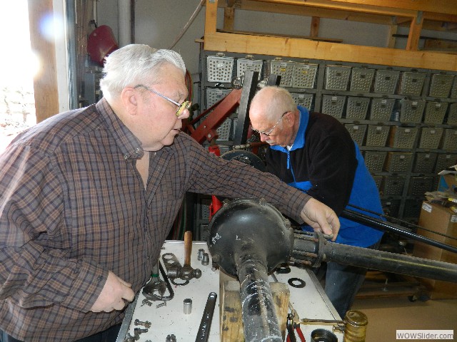 Bruce and Neil disasembling the differential and drive shaft assembly.