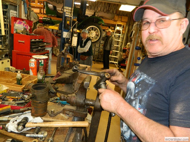 Mike replacing bronze bushing in the steering spindles.