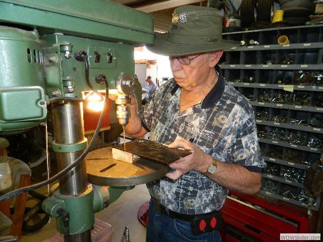 Neil drilling the spare tire bracket.
