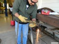 Jeff cutting the spare tire bracket.