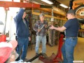 Neil, Larry, and Michael dissasembling Tom's 1926 engine