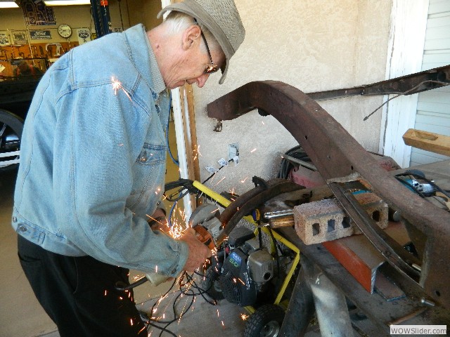 John working on a frame cross member