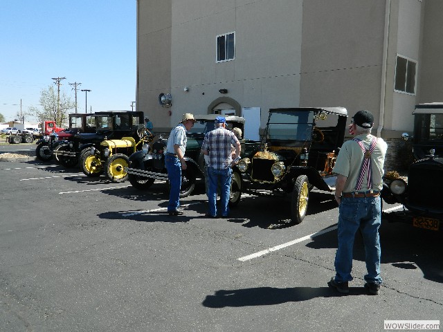 Tin Lizzies unloaded in the hotel parking lot