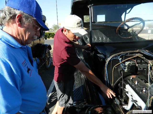 Orlando showing Larry his engine