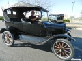 Orlando Ortega arriving in his 1924 Model T touring car