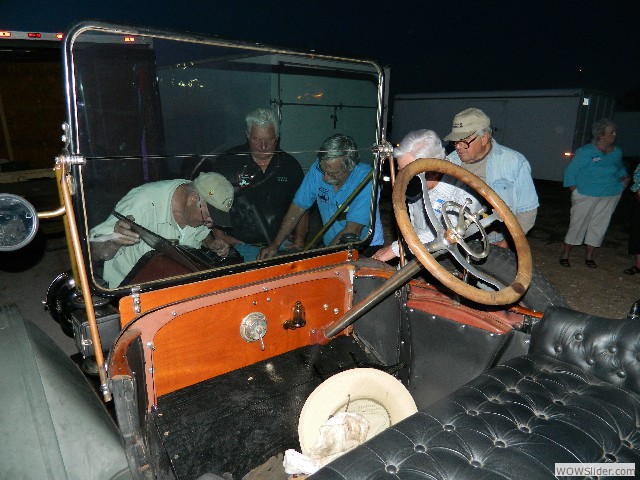 Jerry, Les, E.J., Larry, and Vernon working on 1913 Buick engine
